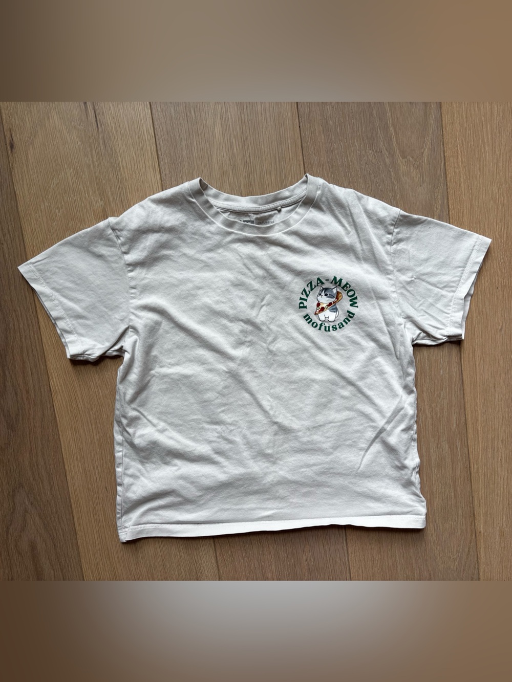 Uniqlo Kids White Graphic Tee with Green Logo Mofusand